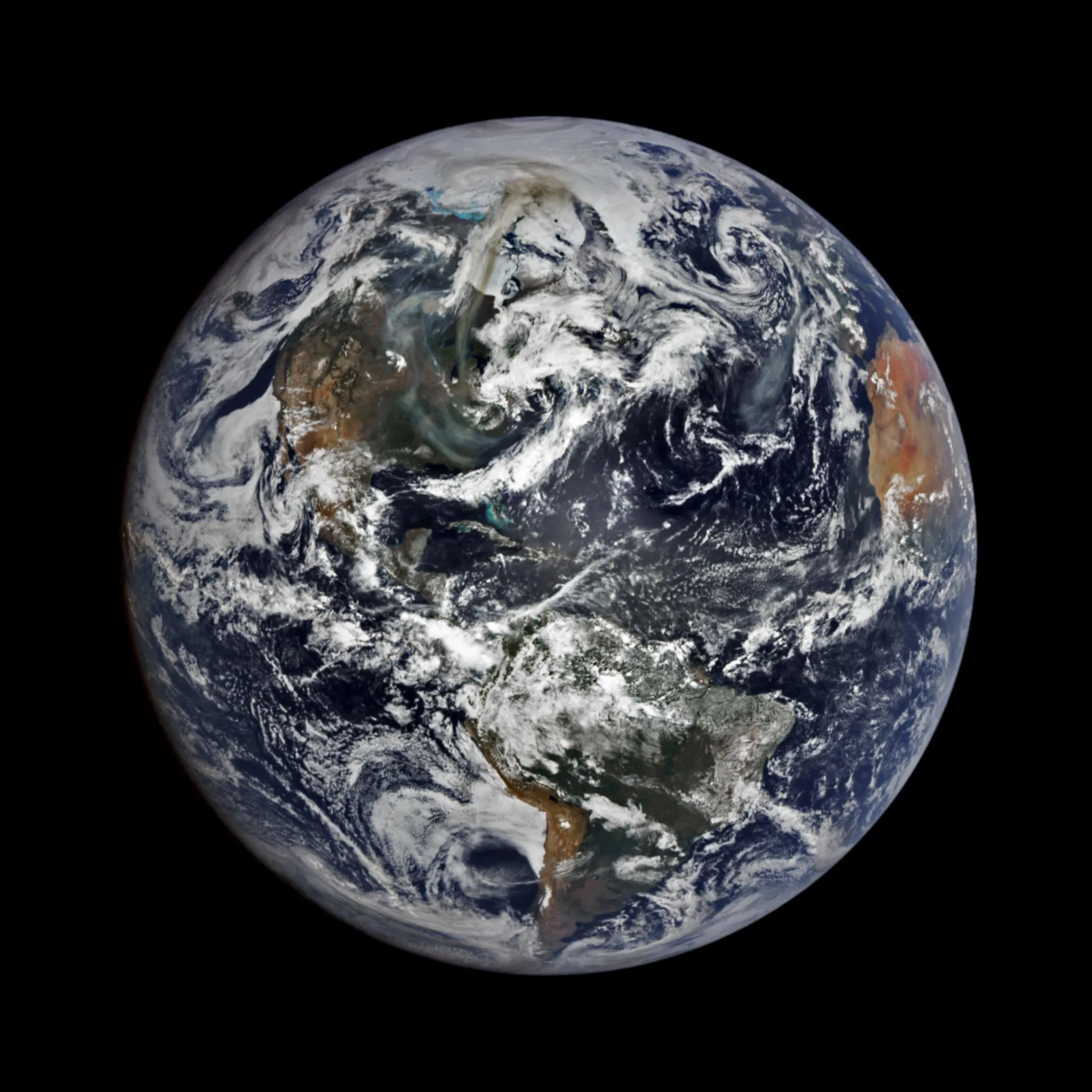 A view of Earth from space showing massive smoke plumes originating from Canada, visible from one million miles away.